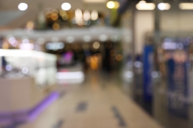 Blurred view of modern shopping mall interior. Bokeh effect