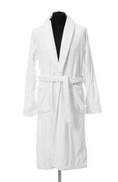 Photo of Soft clean cotton bathrobe on white background