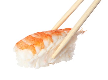 Chopsticks with delicious nigiri sushi isolated on white