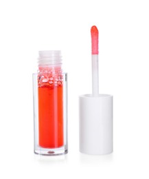 Photo of Bright lip gloss and applicator isolated on white. Cosmetic product