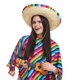 Young woman in Mexican sombrero hat and poncho playing ukulele on white background