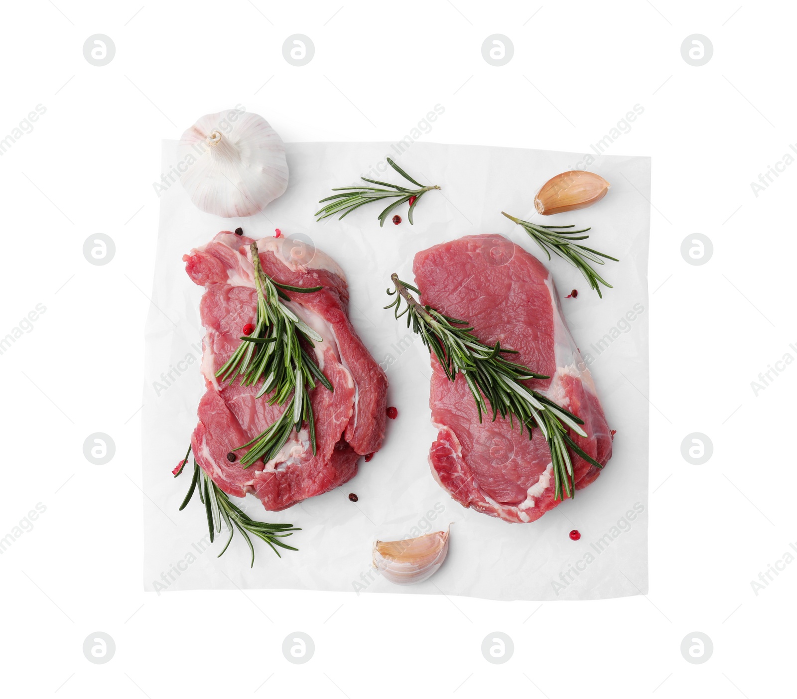 Photo of Fresh raw meat with rosemary and spices isolated on white, top view