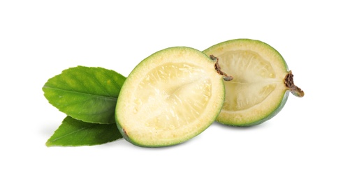 Cut feijoa with leaves on white background