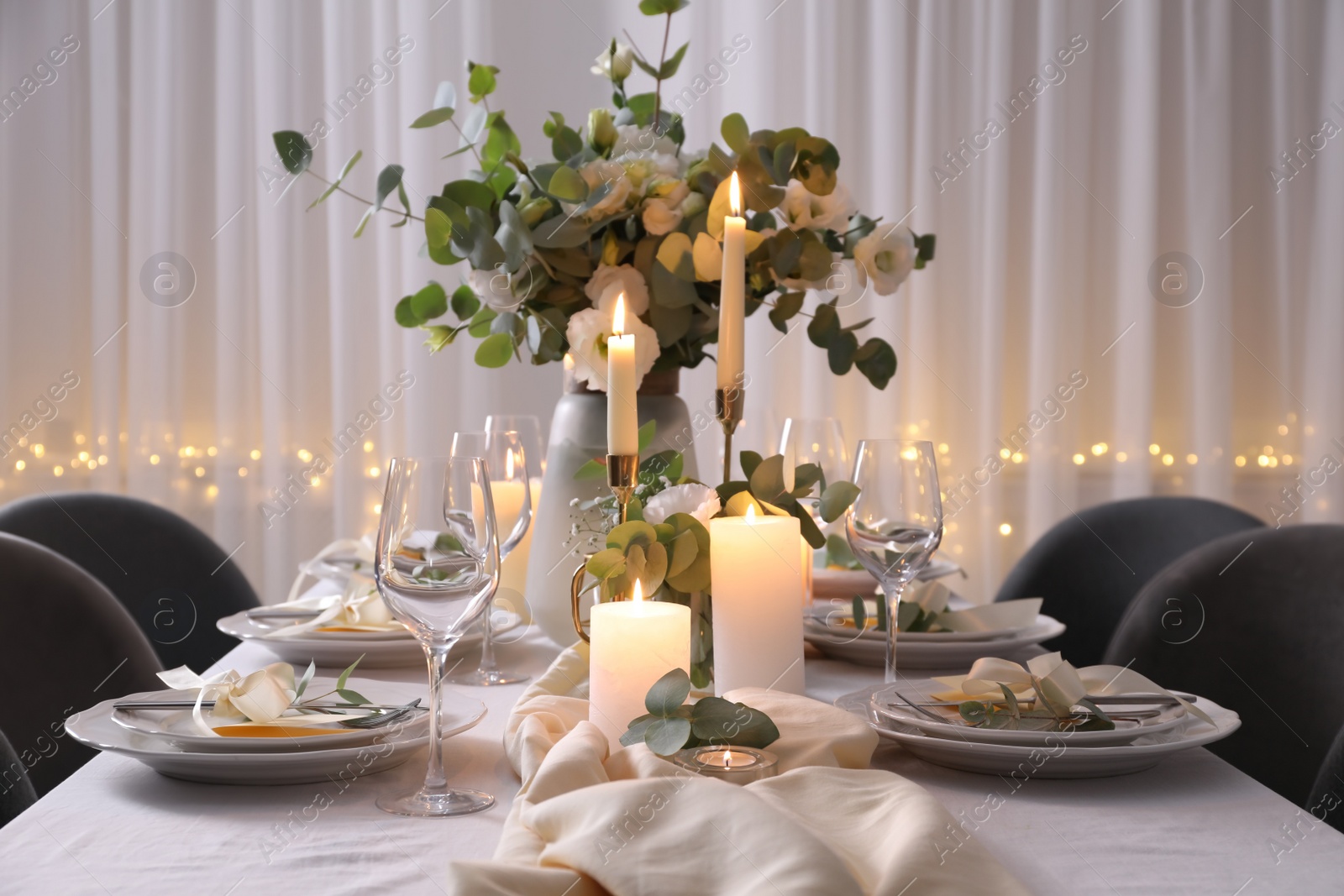 Photo of Festive table setting with beautiful decor indoors