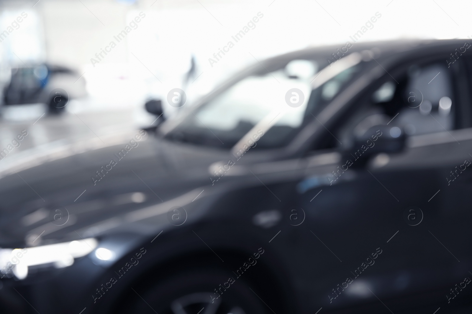 Photo of Blurred view of automobile at professional car wash service