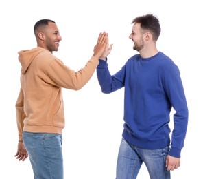 Photo of Men giving high five on white background