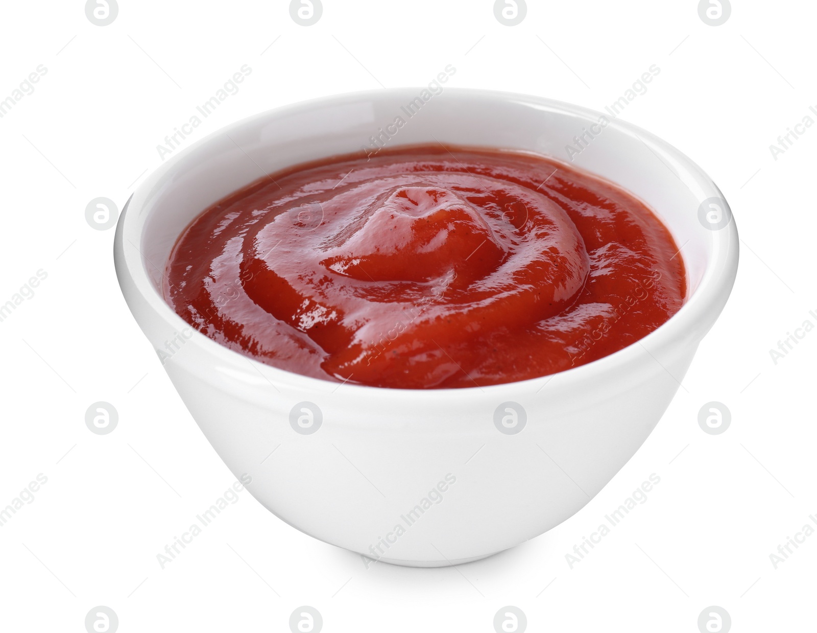 Photo of Tasty tomato sauce in bowl isolated on white