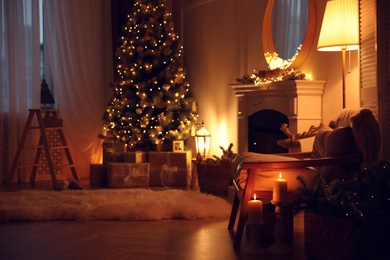 Beautiful room interior with Christmas tree and fireplace