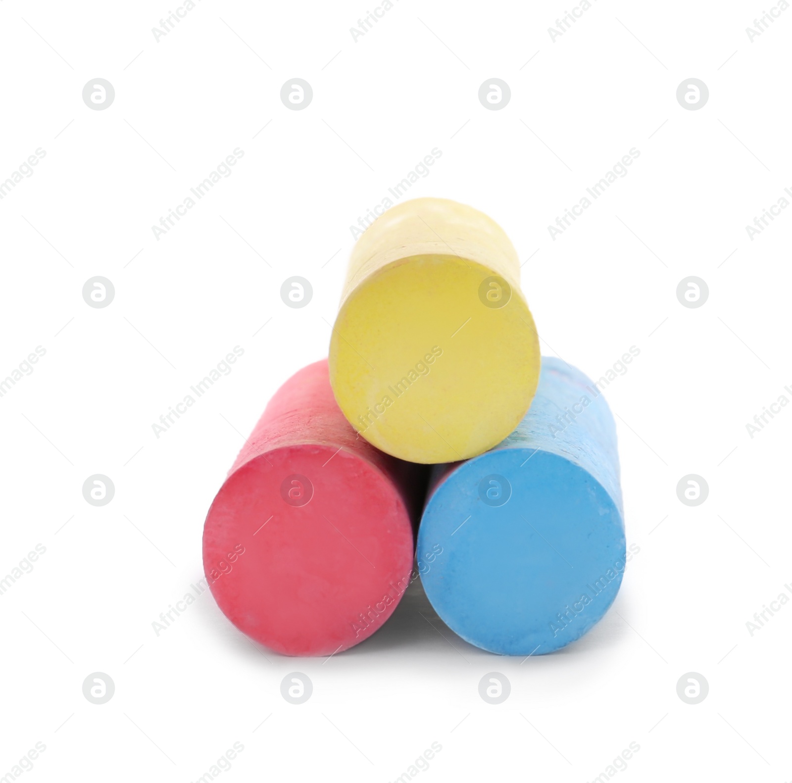 Photo of Color pieces of chalk on white background