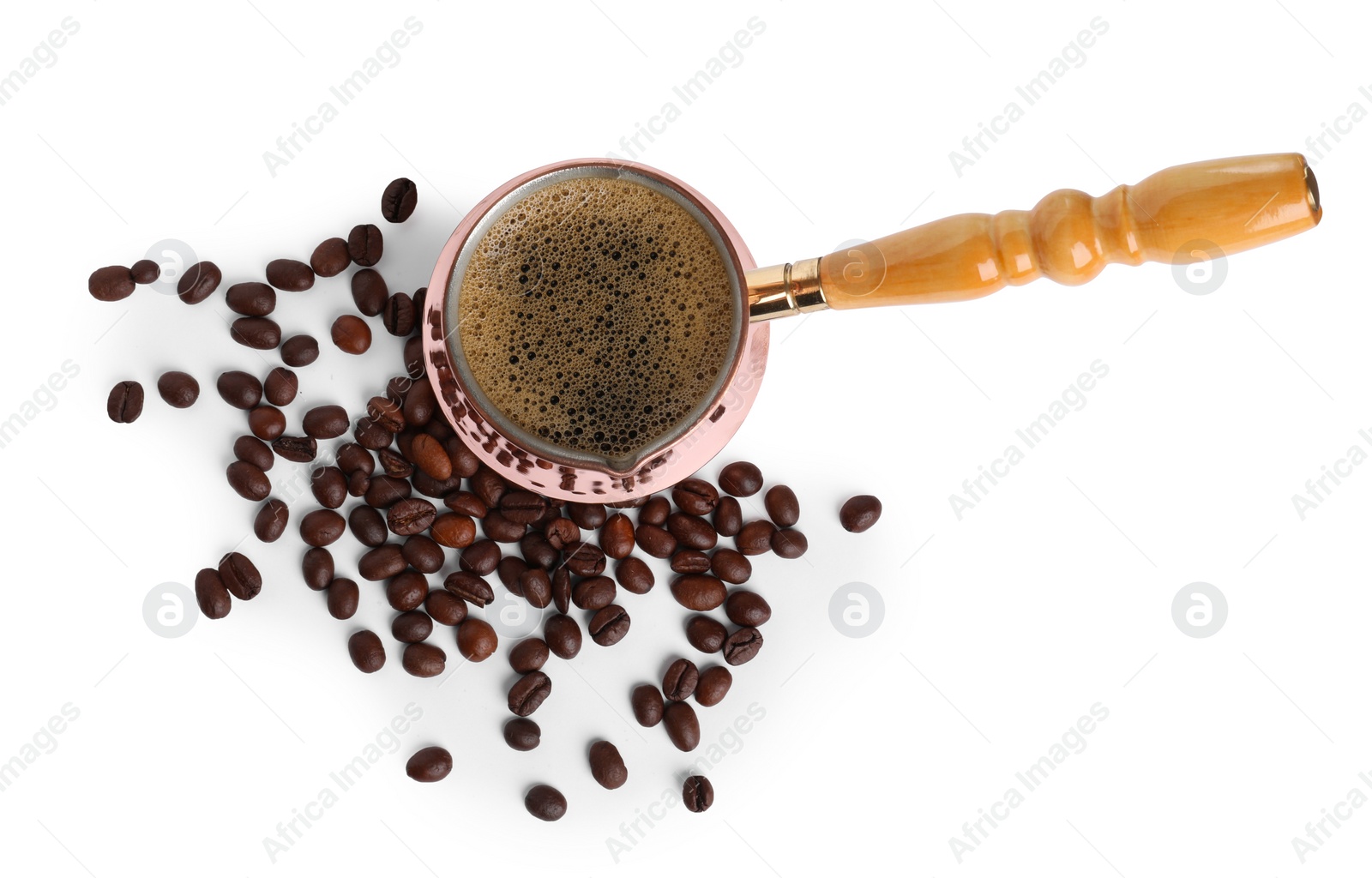 Photo of Turkish coffee. Cezve with hot coffee and beans on white background, top view