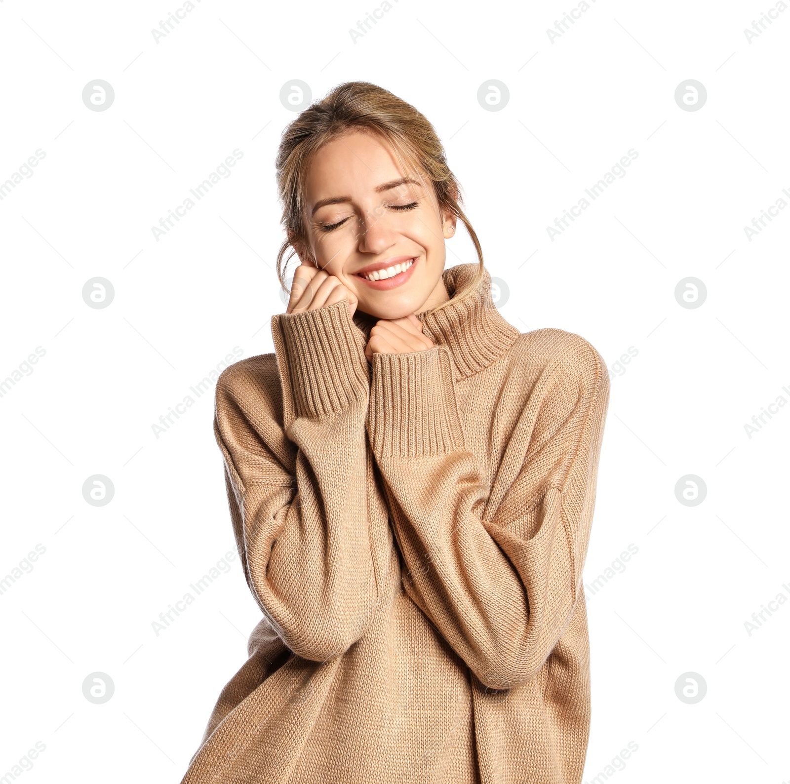 Photo of Beautiful young woman wearing knitted sweater on white background