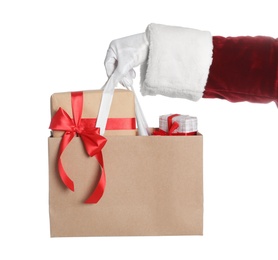 Santa holding paper bag with gift boxes on white background, closeup