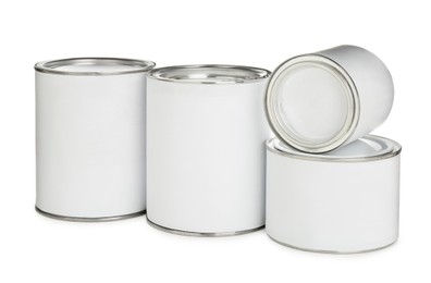 Photo of Closed blank cans of paint isolated on white