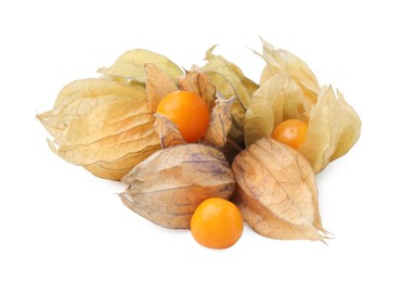 Photo of Many ripe physalis fruits with calyxes isolated on white