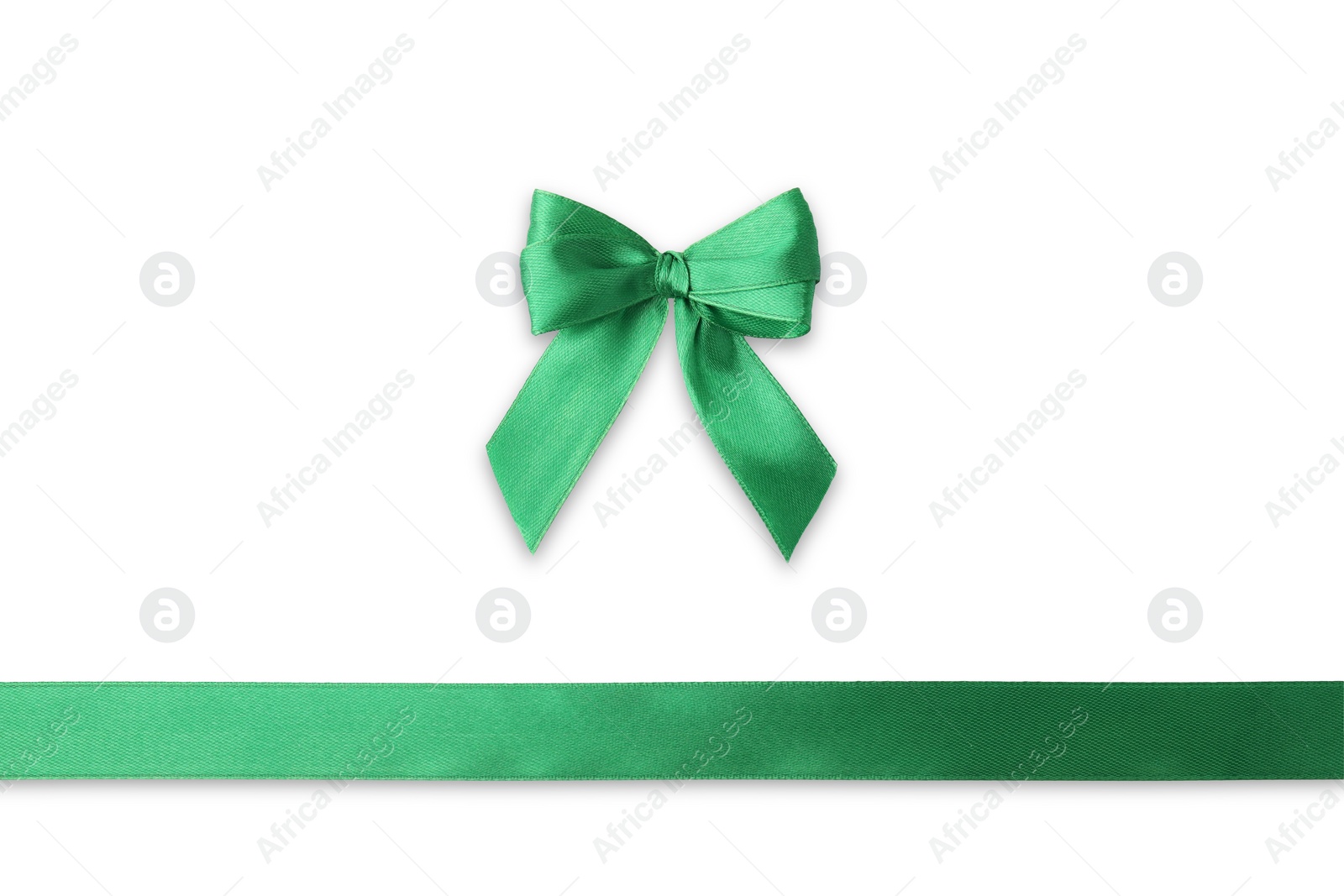 Photo of Green satin ribbon with bow isolated on white, top view