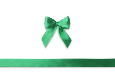 Green satin ribbon with bow isolated on white, top view