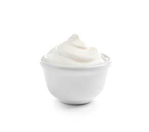 Photo of Ceramic bowl with fresh sour cream isolated on white