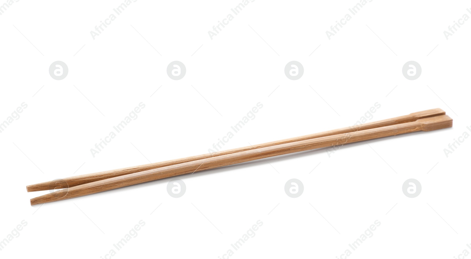 Photo of Chopsticks made of bamboo on white background