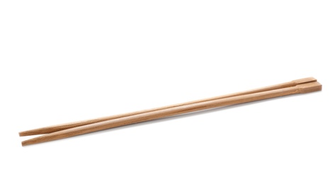 Photo of Chopsticks made of bamboo on white background