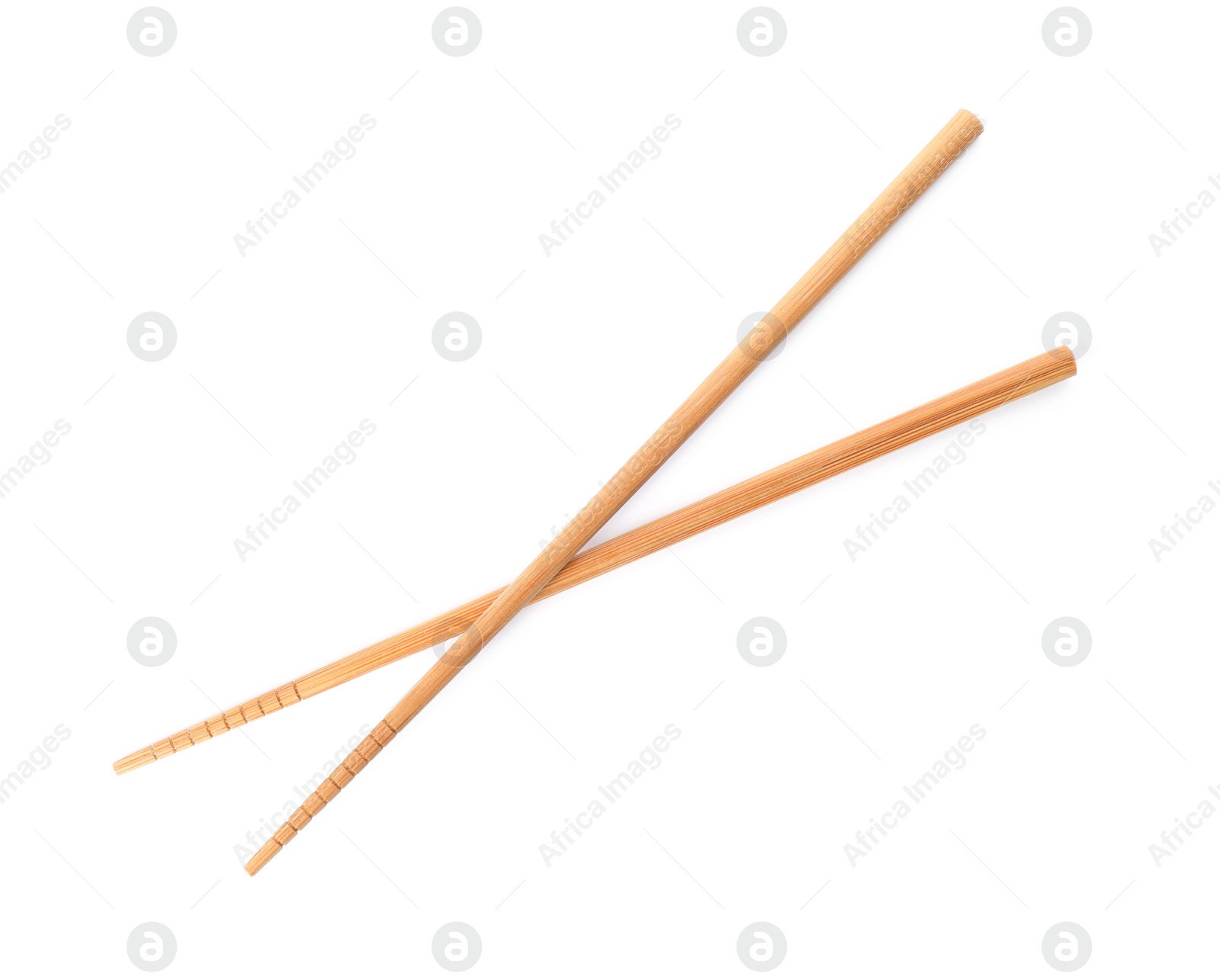 Photo of Chopsticks made of bamboo on white background, top view