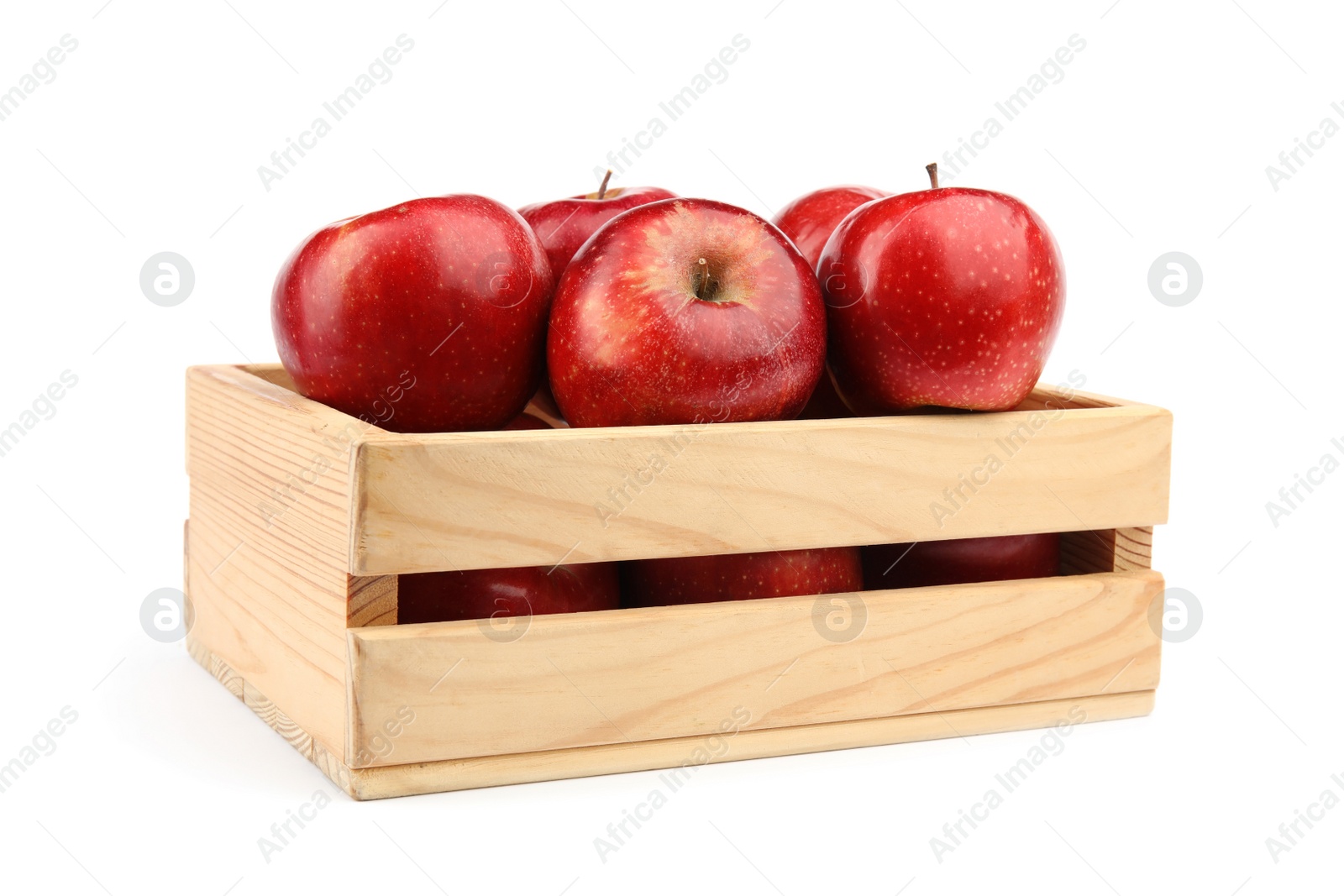 Photo of Wooden crate of ripe juicy red apples on white background