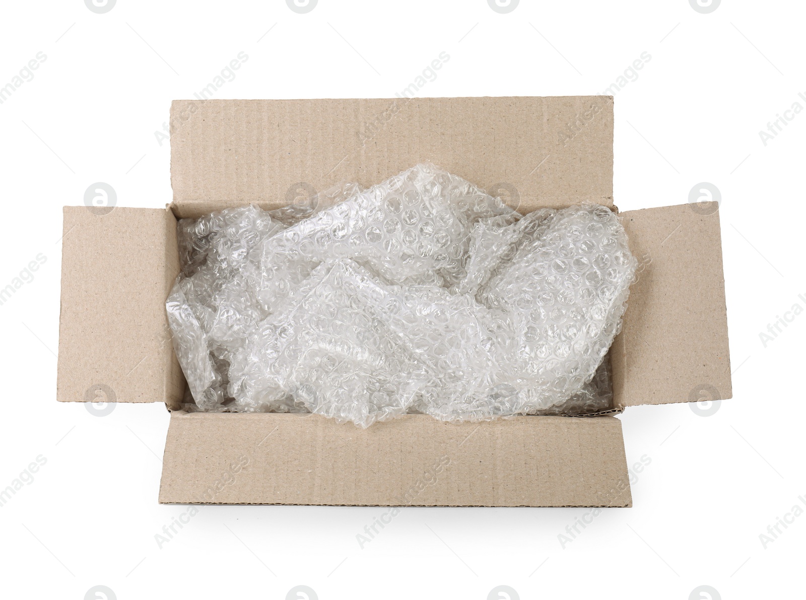 Photo of Transparent bubble wrap in cardboard box isolated on white