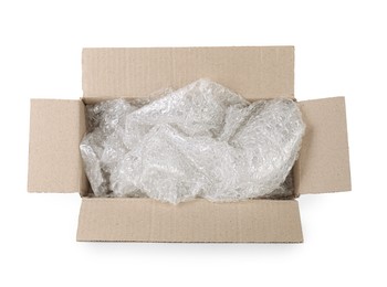 Photo of Transparent bubble wrap in cardboard box isolated on white