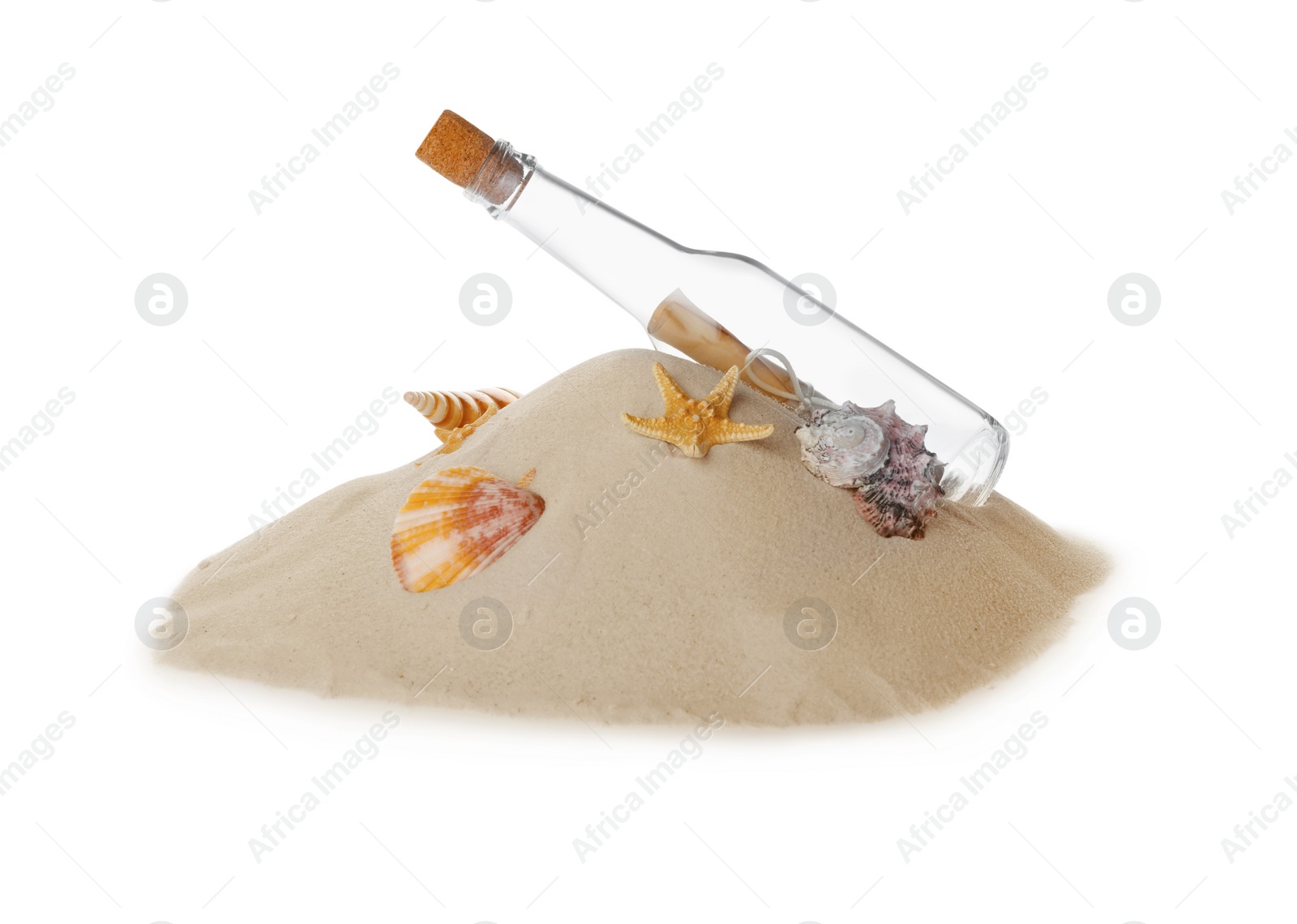 Photo of Corked glass bottle with rolled paper note and seashells on sand against white background