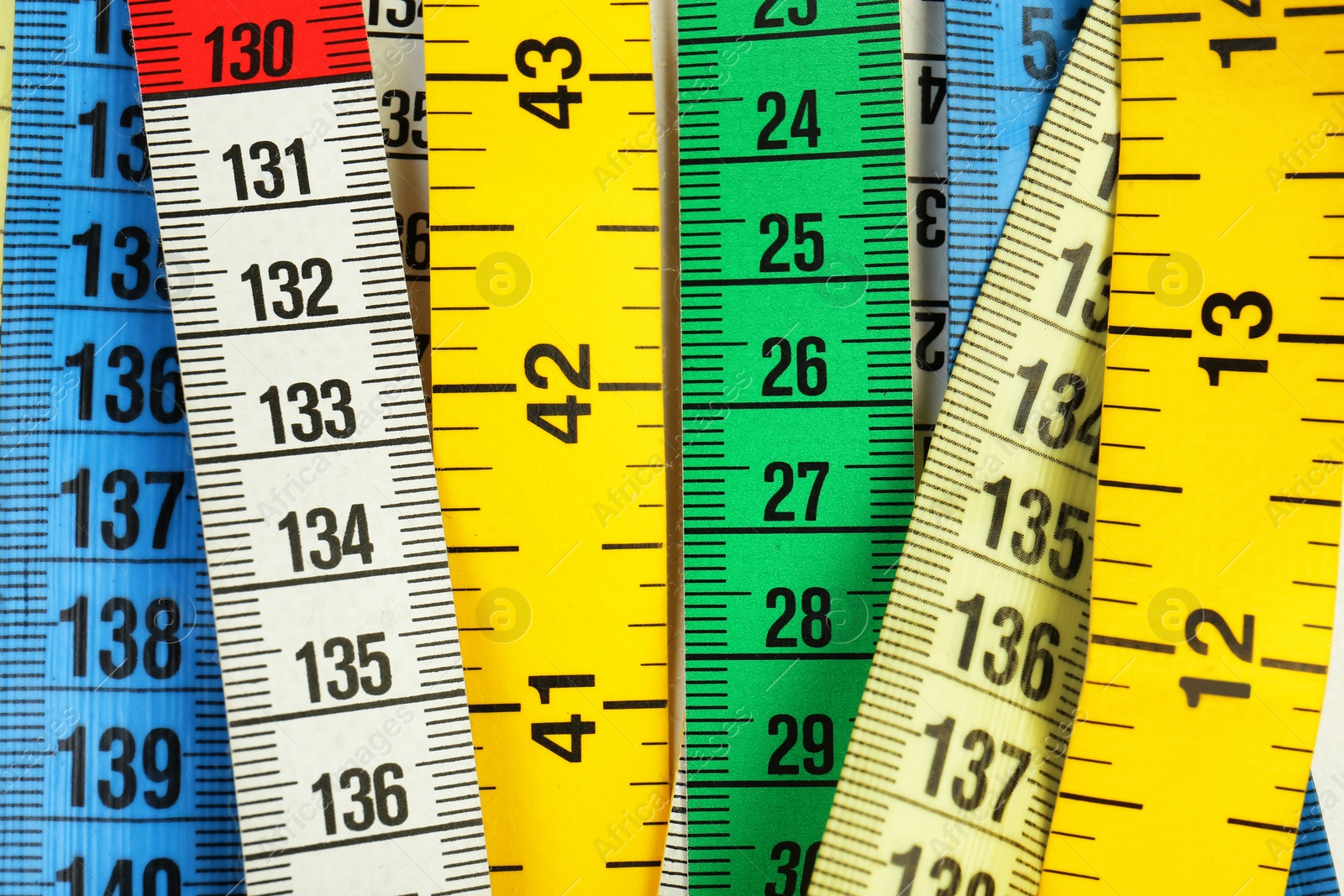 Photo of Different measuring tapes, closeup