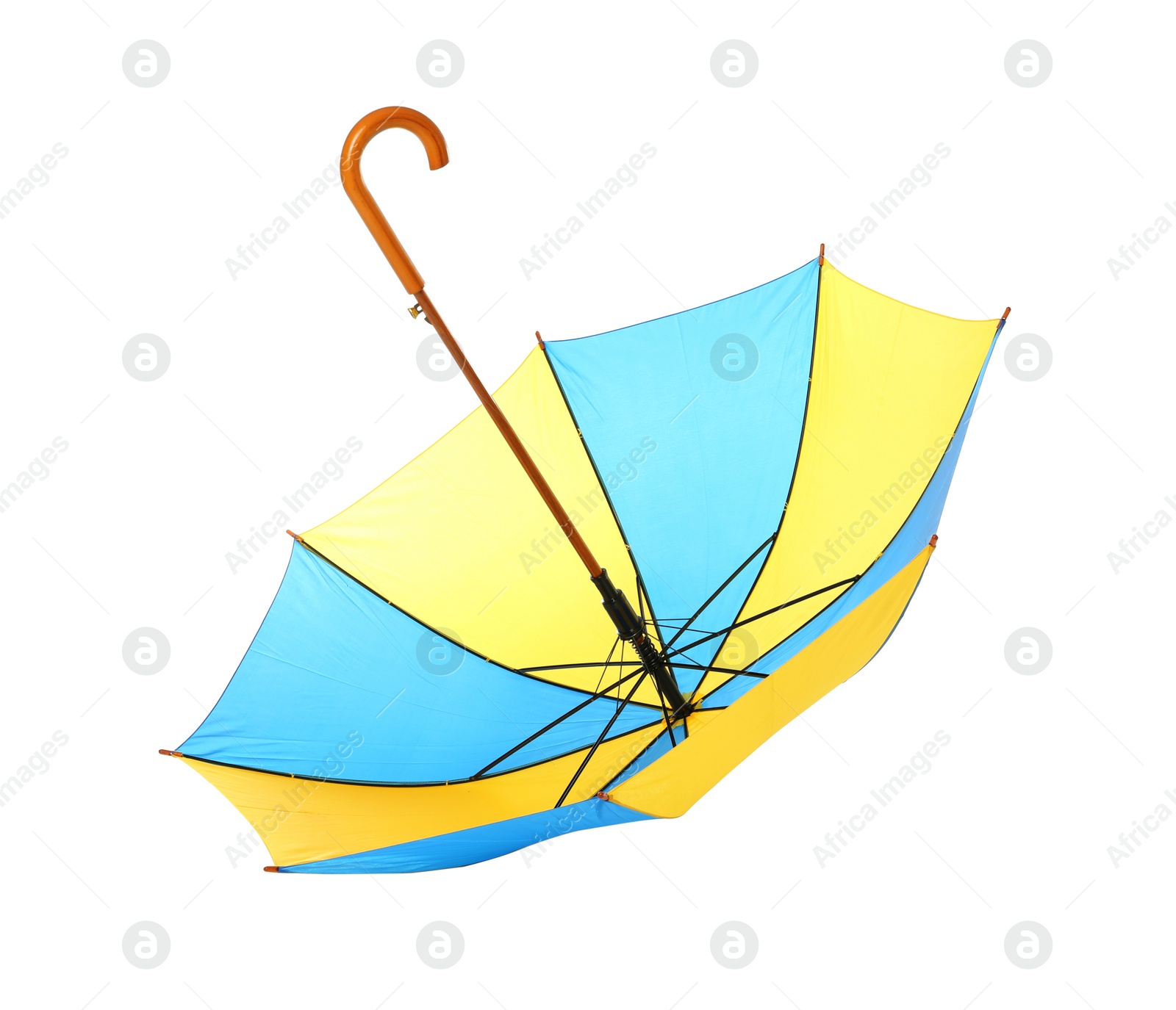 Photo of Modern opened bright umbrella isolated on white