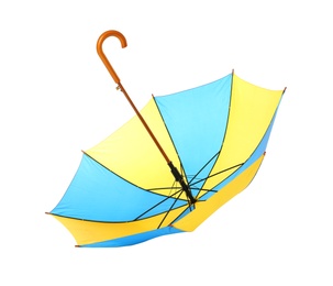 Photo of Modern opened bright umbrella isolated on white