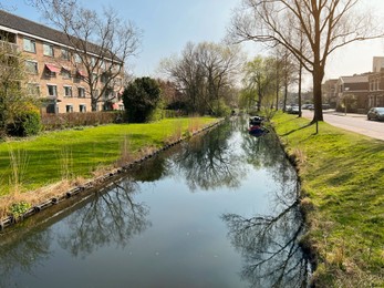 Photo of Picturesque view of beautiful city canal on sunny spring day