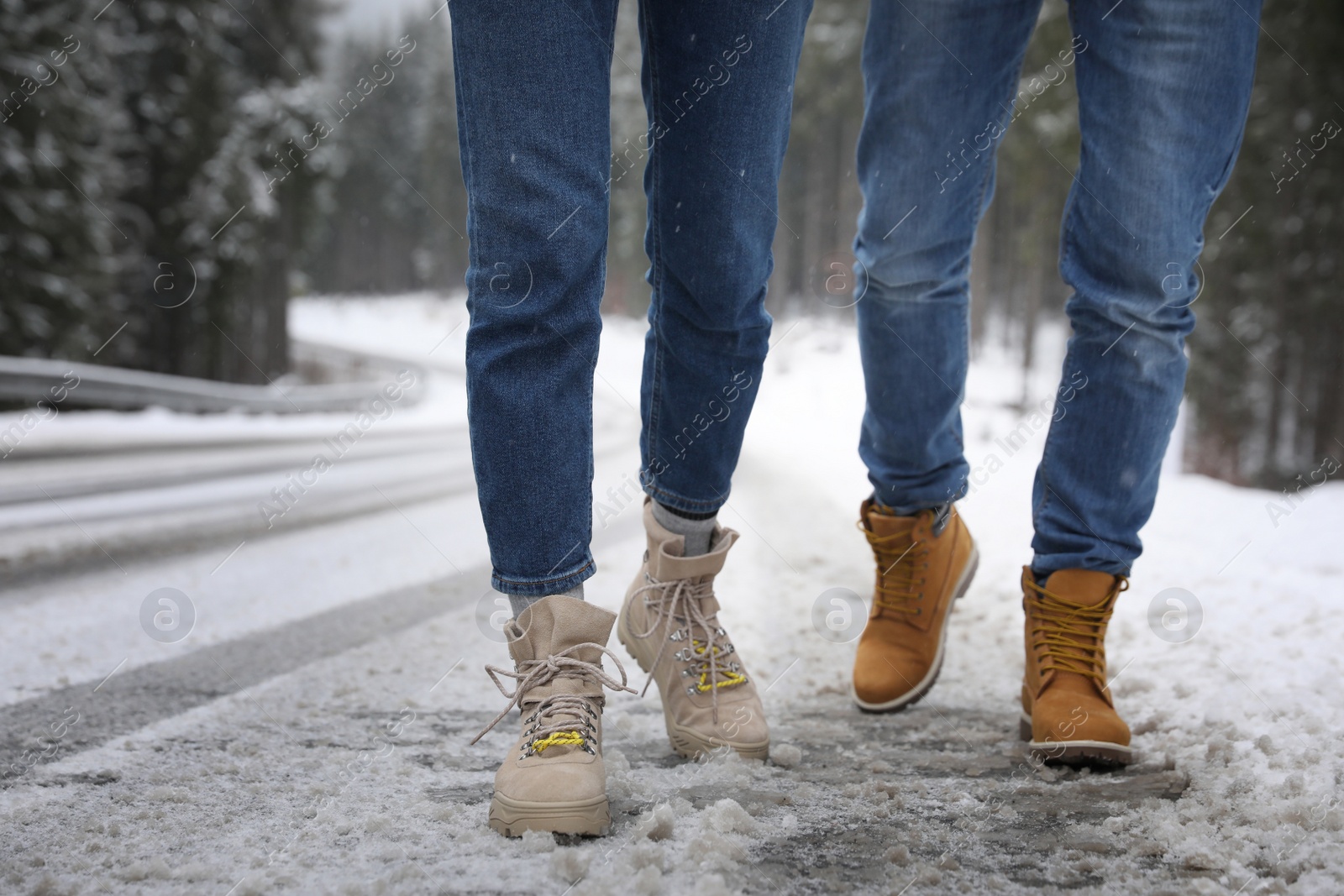 Photo of People walking outdoors on snowy winter day