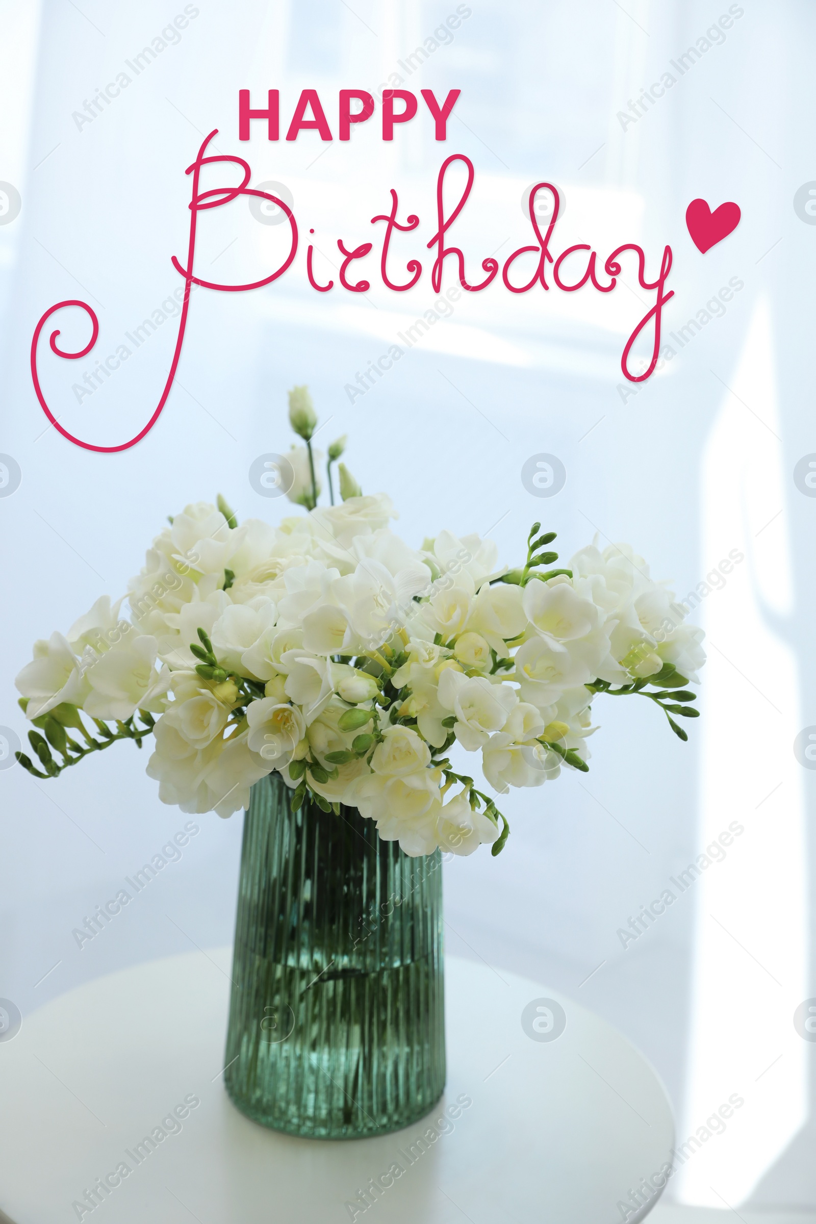 Image of Happy Birthday! Beautiful white freesia flowers in vase on table indoors