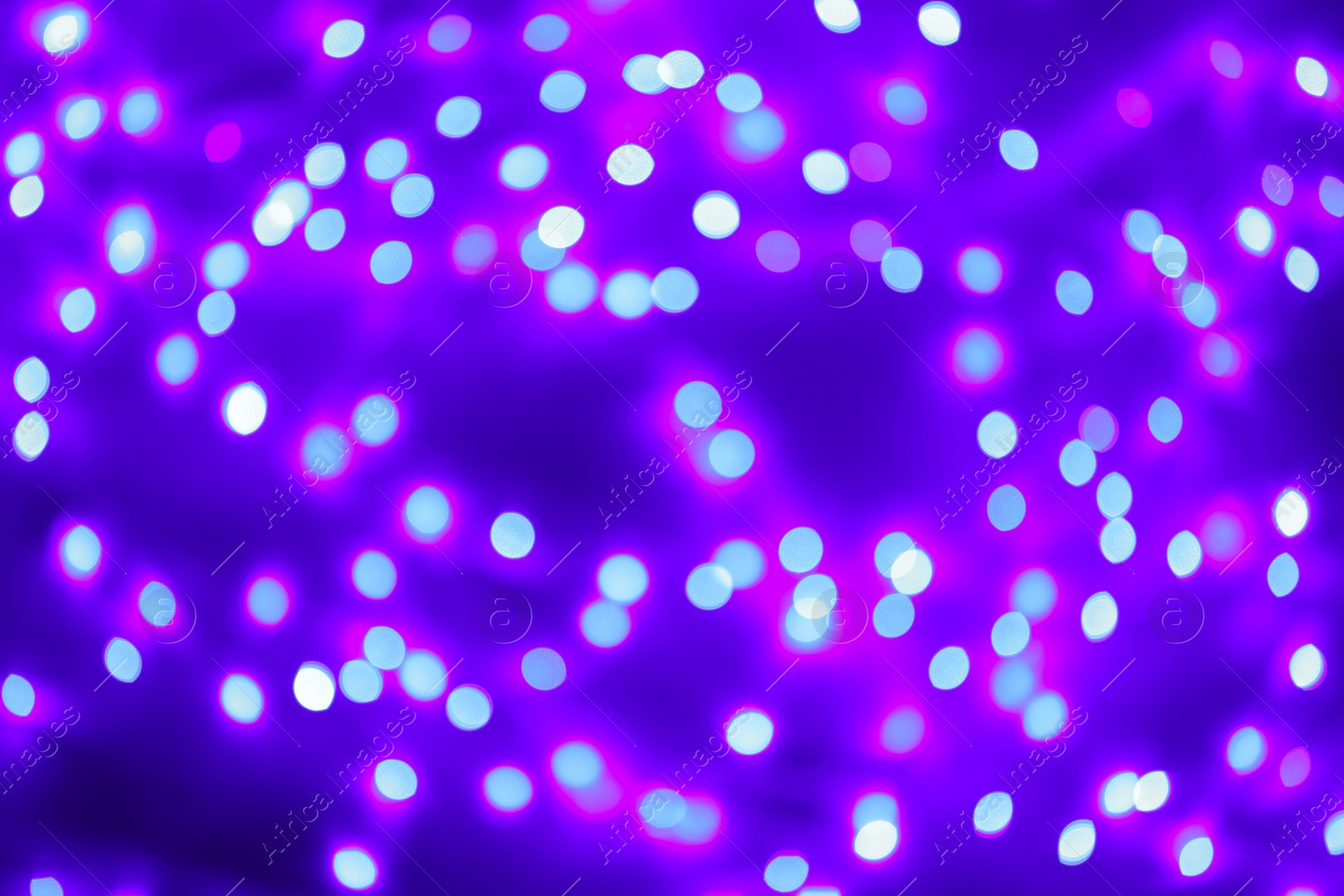 Photo of Beautiful glowing lights as background. Bokeh effect