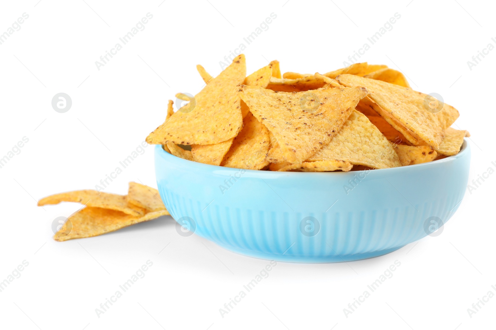 Photo of Bowl with tasty Mexican nachos chips on white background