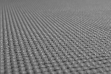 Photo of Grey sports mat texture as background, closeup