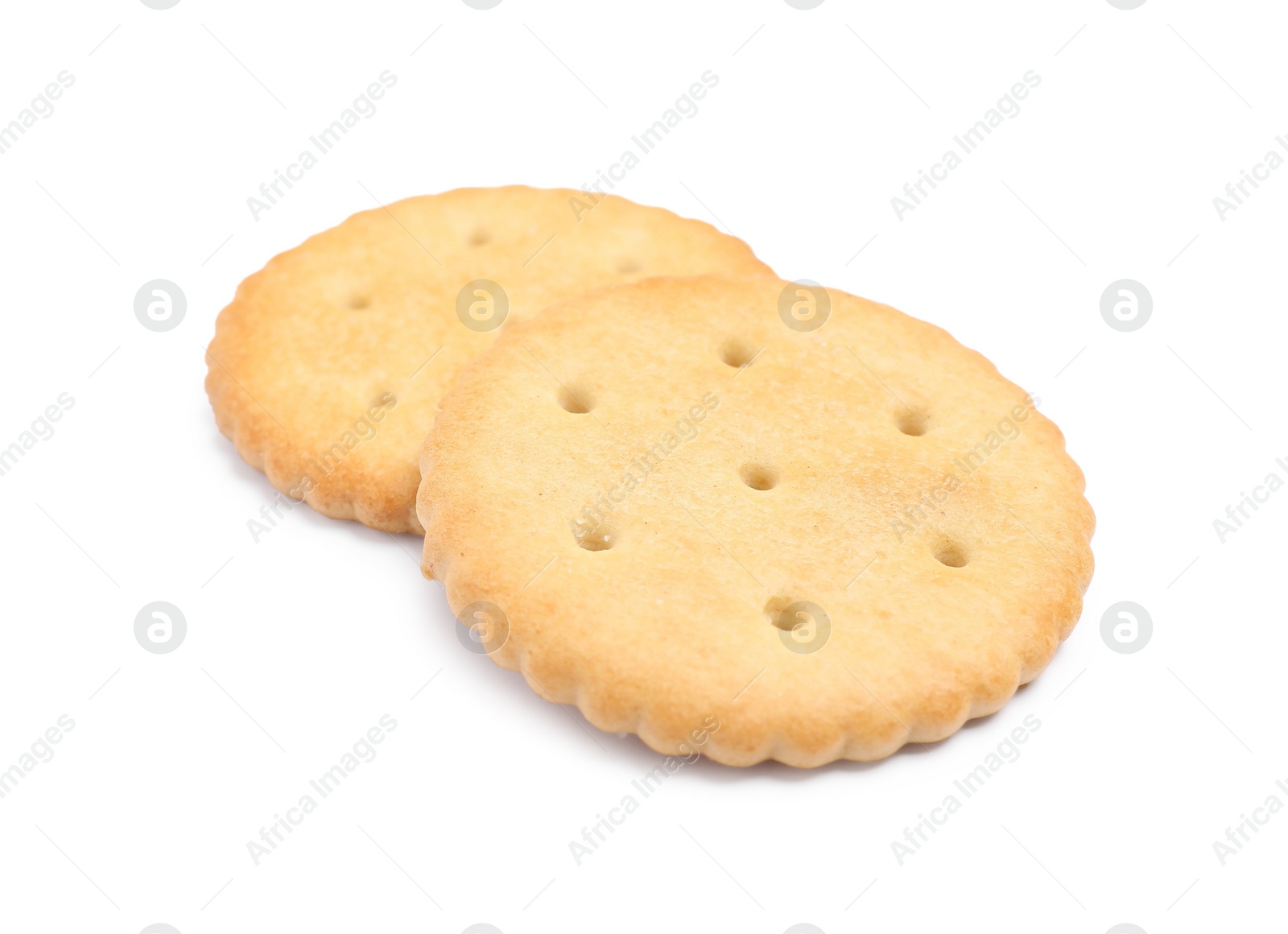 Photo of Two crispy crackers isolated on white. Delicious snack