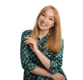 Portrait of beautiful young woman with blonde hair on white background