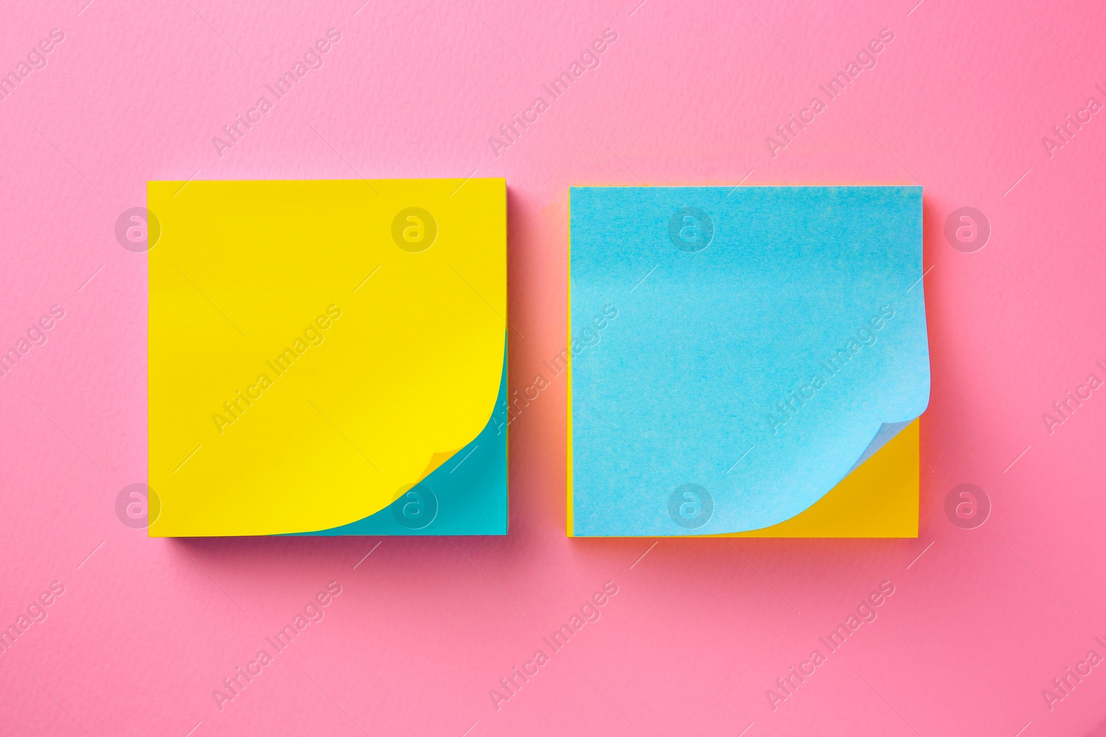 Photo of Blank paper notes on pink background, flat lay