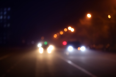 Photo of Blurred view of night city. Bokeh effect