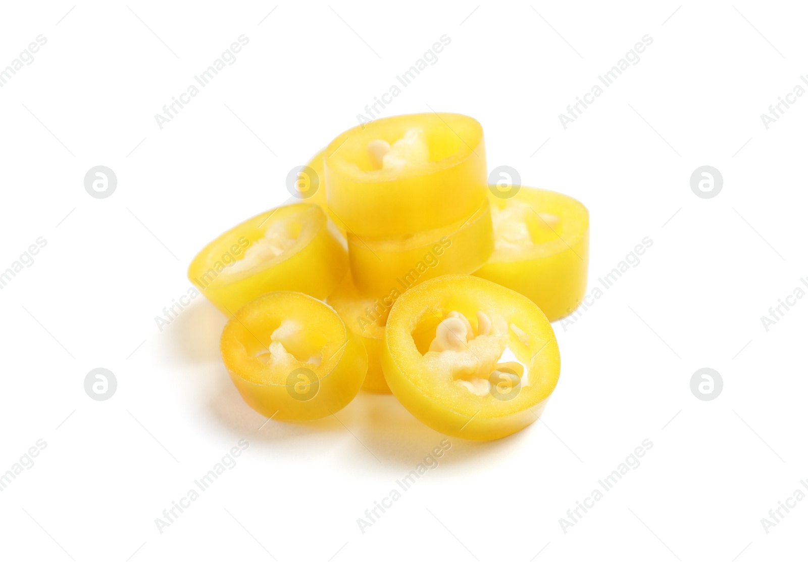 Photo of Cut ripe yellow chili pepper isolated on white
