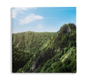 Photo printed on canvas, white background. Picturesque view of beautiful mountains on sunny day