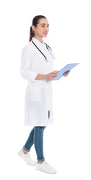 Photo of Full length portrait of medical doctor with clipboard and stethoscope isolated on white