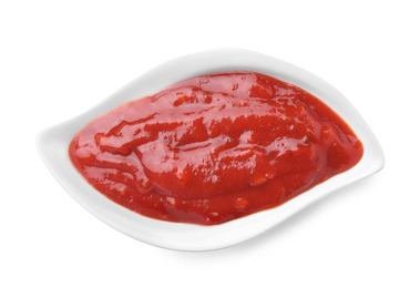 Gravy boat with red sauce isolated on white, top view