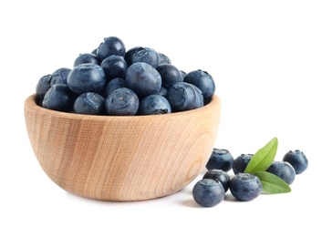 Photo of Bowl of fresh raw blueberries with leaves isolated on white