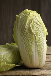 Fresh ripe Chinese cabbages on wooden table