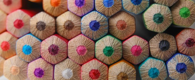 Photo of Many colorful wooden pencils as background, closeup