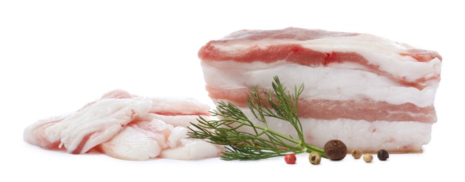 Photo of Pork fatback with peppercorns and dill on white background