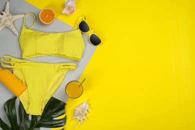 Flat lay composition with beach objects on color background, space for text